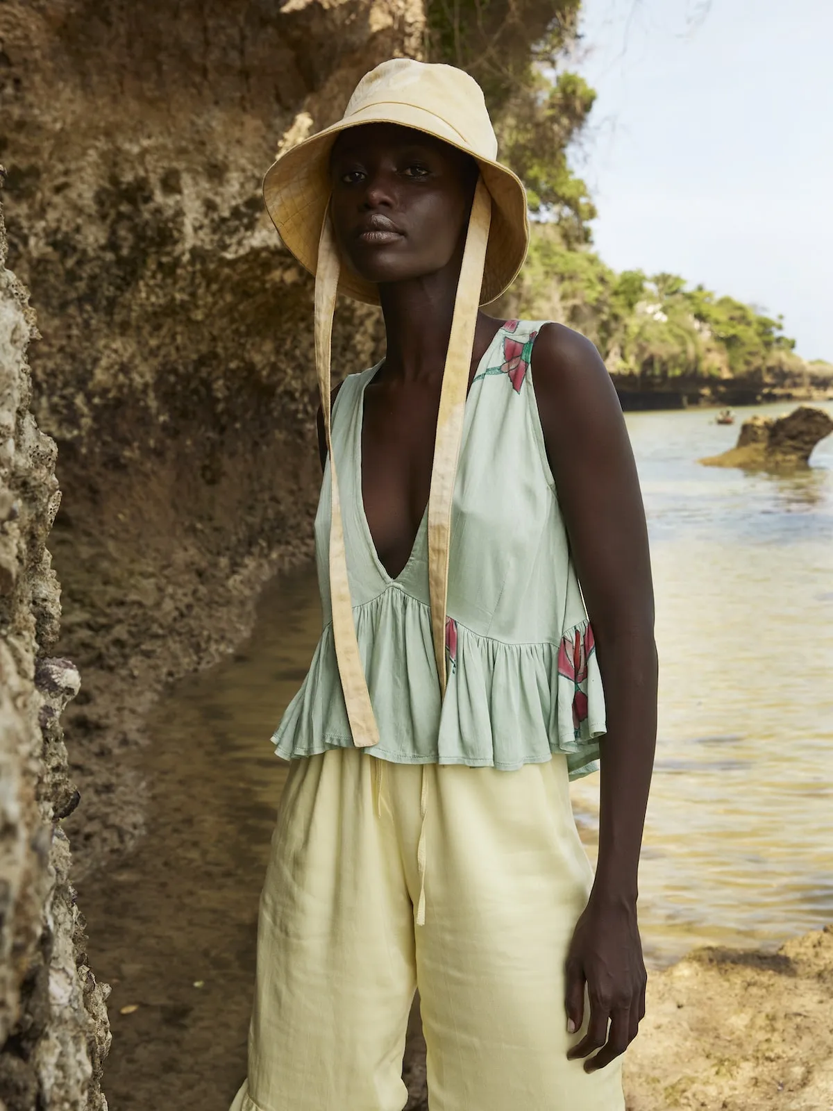 Bee Eater Sleeveless Peplum Top