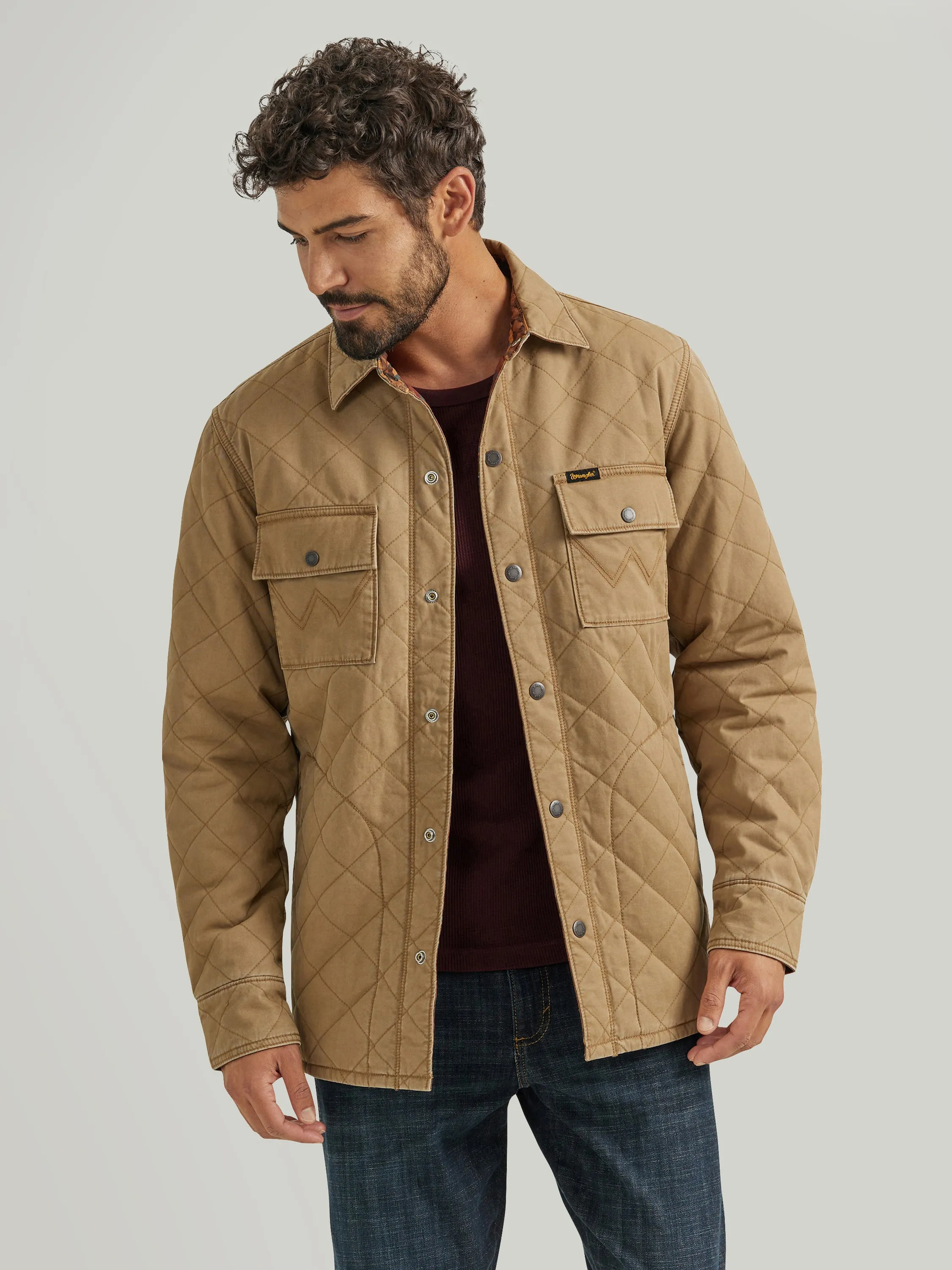 Wrangler Men's Solid Tan Quilted Western Jacket that Reverses to Bright Southwest Print