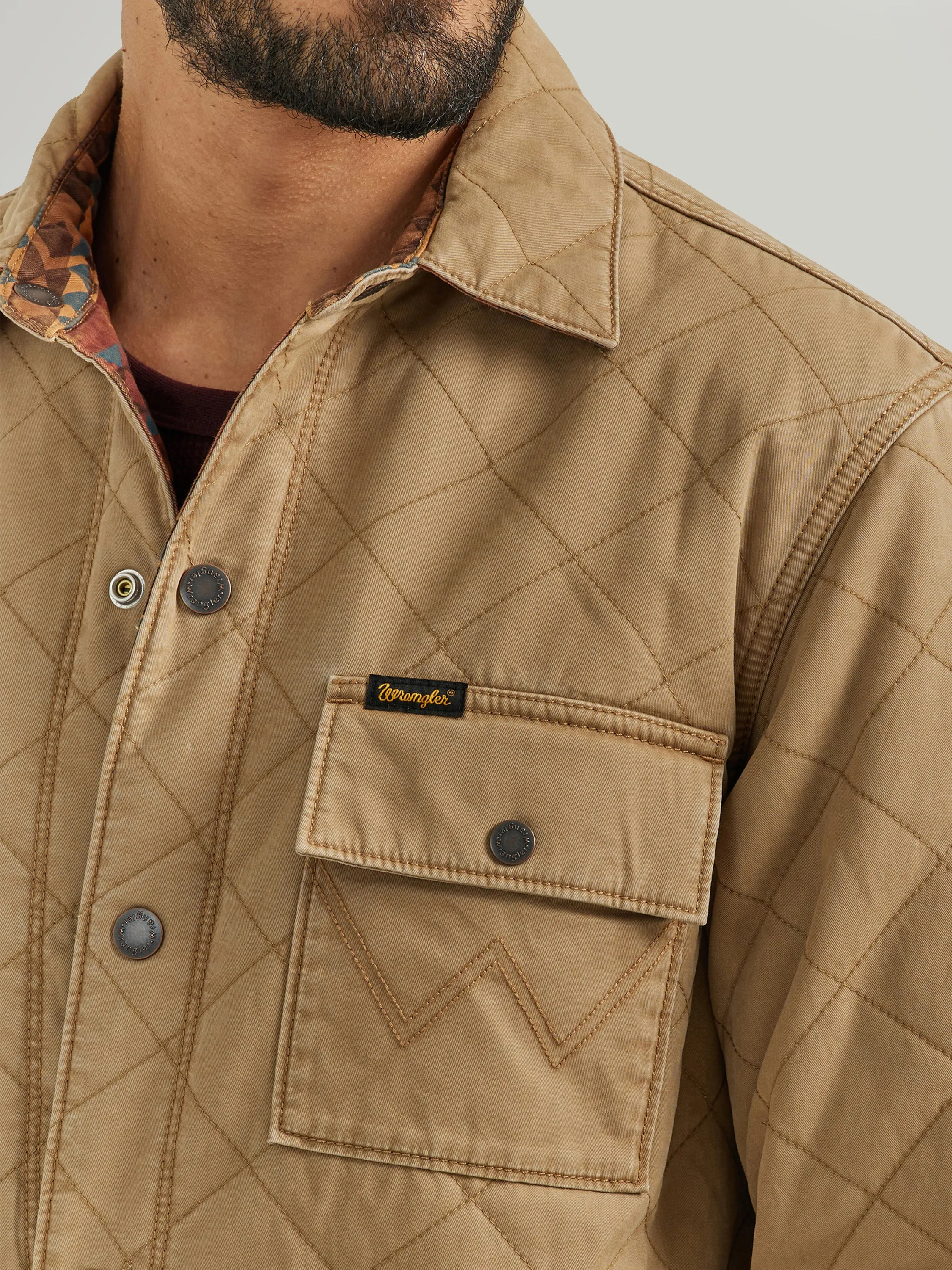 Wrangler Men's Solid Tan Quilted Western Jacket that Reverses to Bright Southwest Print